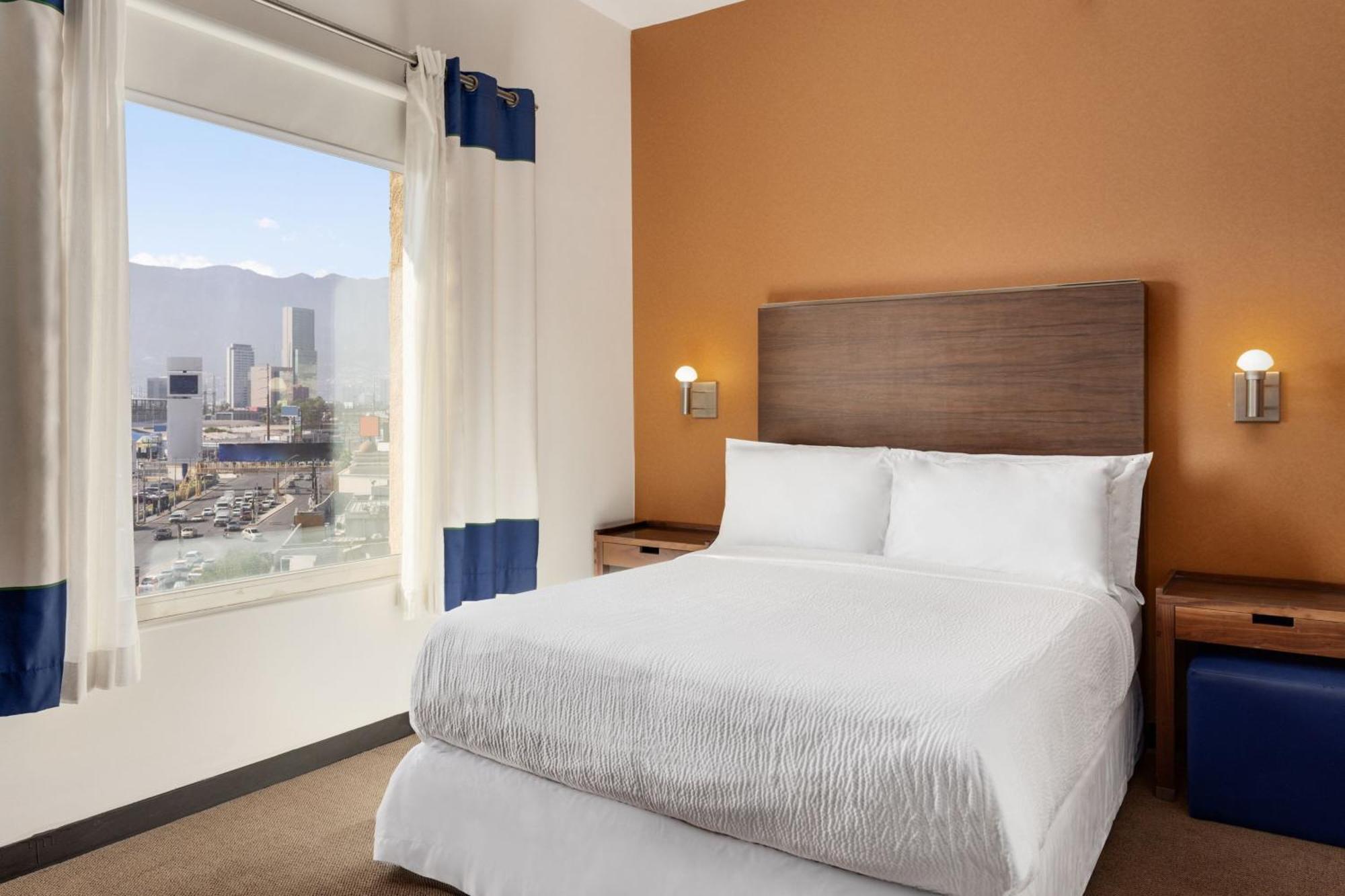 Four Points By Sheraton Galerias Monterrey Kültér fotó A typical bedroom in a Residence Inn